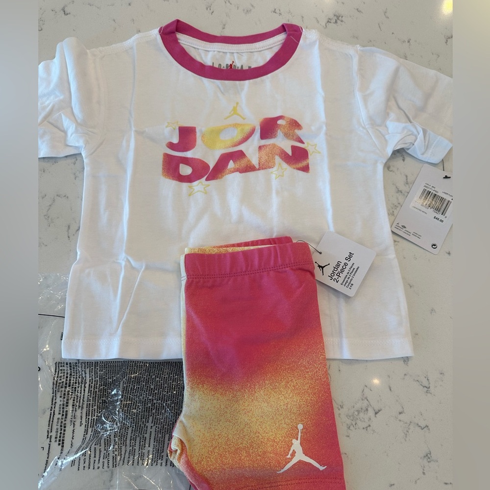 NWT Air Jordan Tee and short set. Size 4T. White and pink.